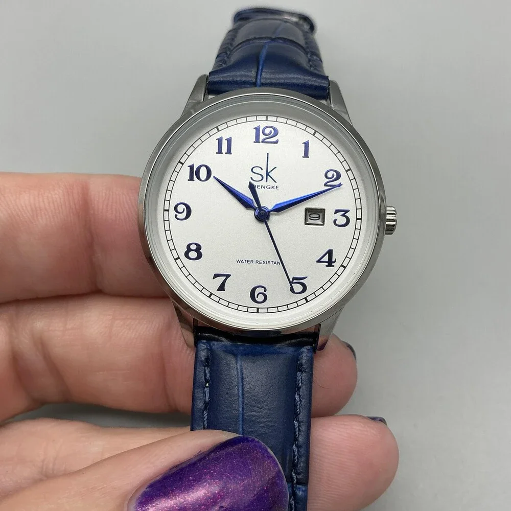 Shengke Womens Watch 32mm Silver Tone Blue Leather Band Date New Battery